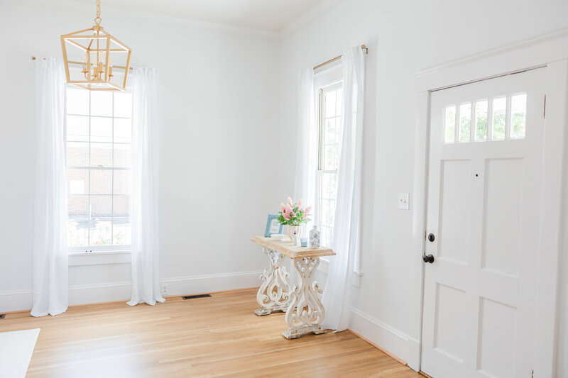 a light and airy room inside a photography studio