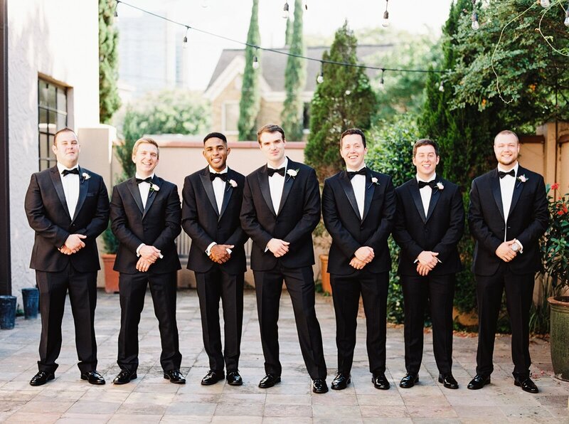 KC groomsen posing before ceremony