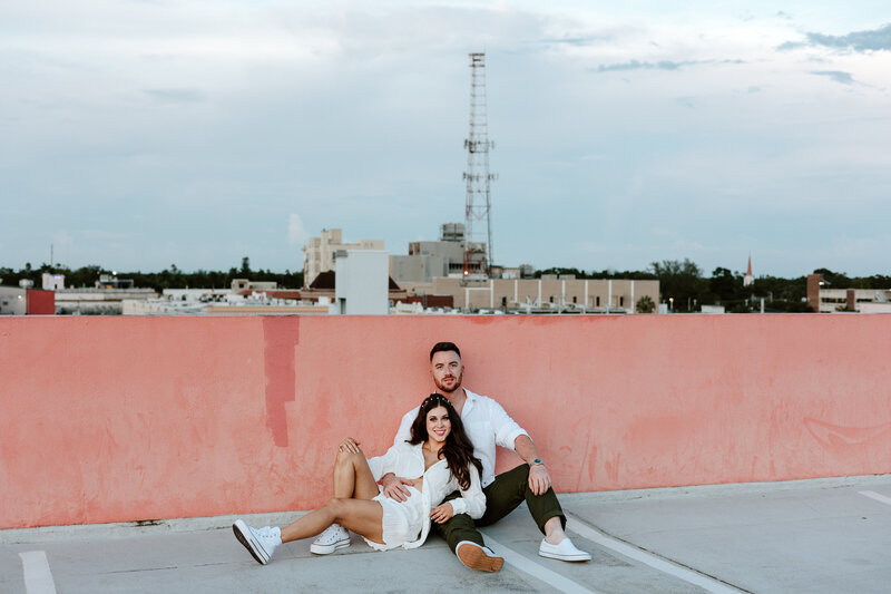 Couple smiling on rooftop