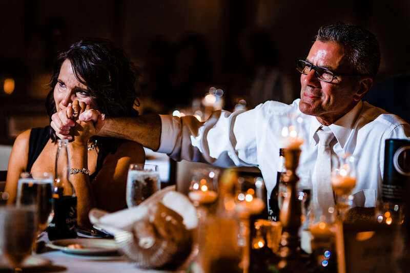 Mother and Father of the bride crying during a toast at the reception in Toledo Ohio