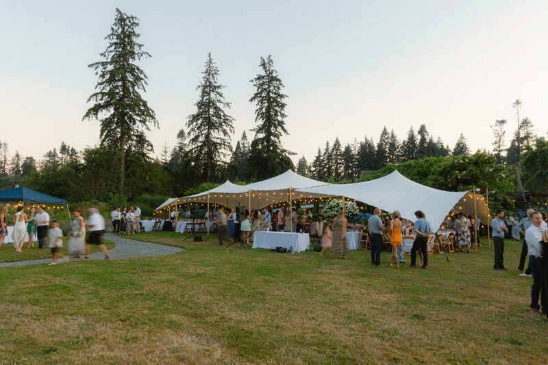 tented reception with lights at the ubc botanical garden