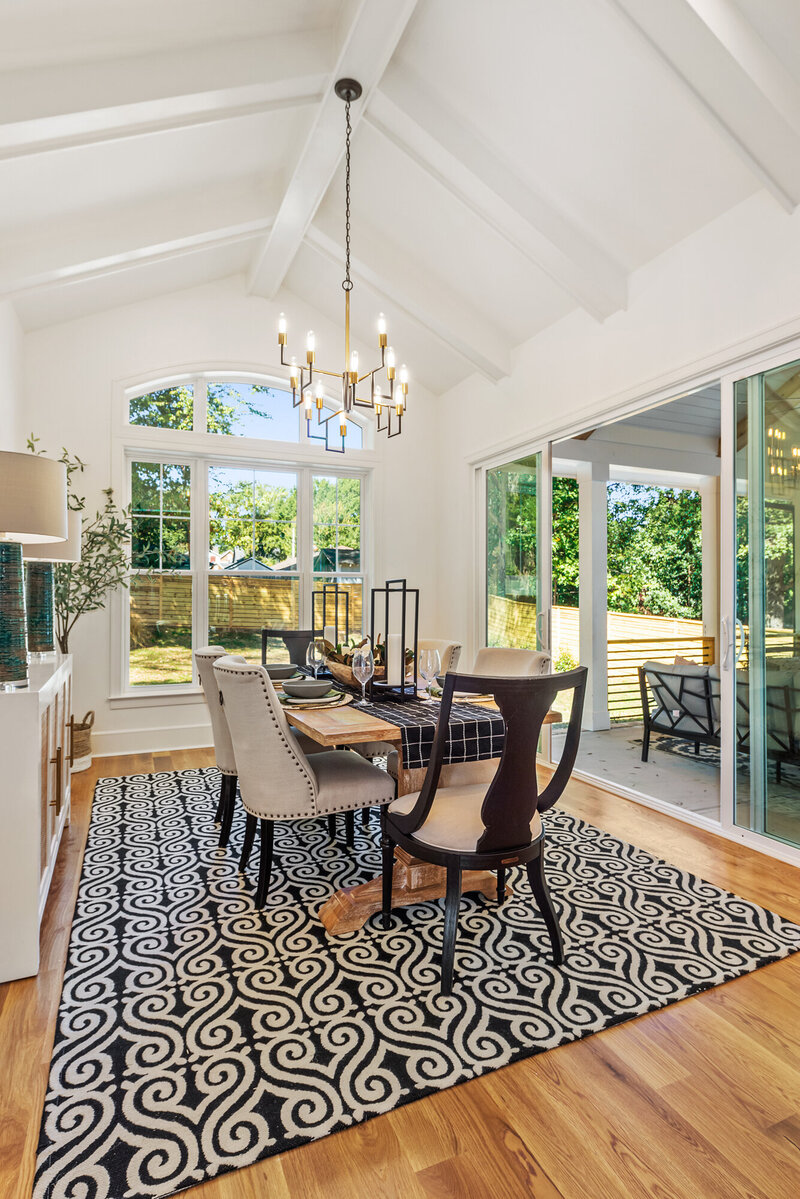 hDining room design with mismatched chairs. Eclectic transitional dining room. Gracious Home Interiors.