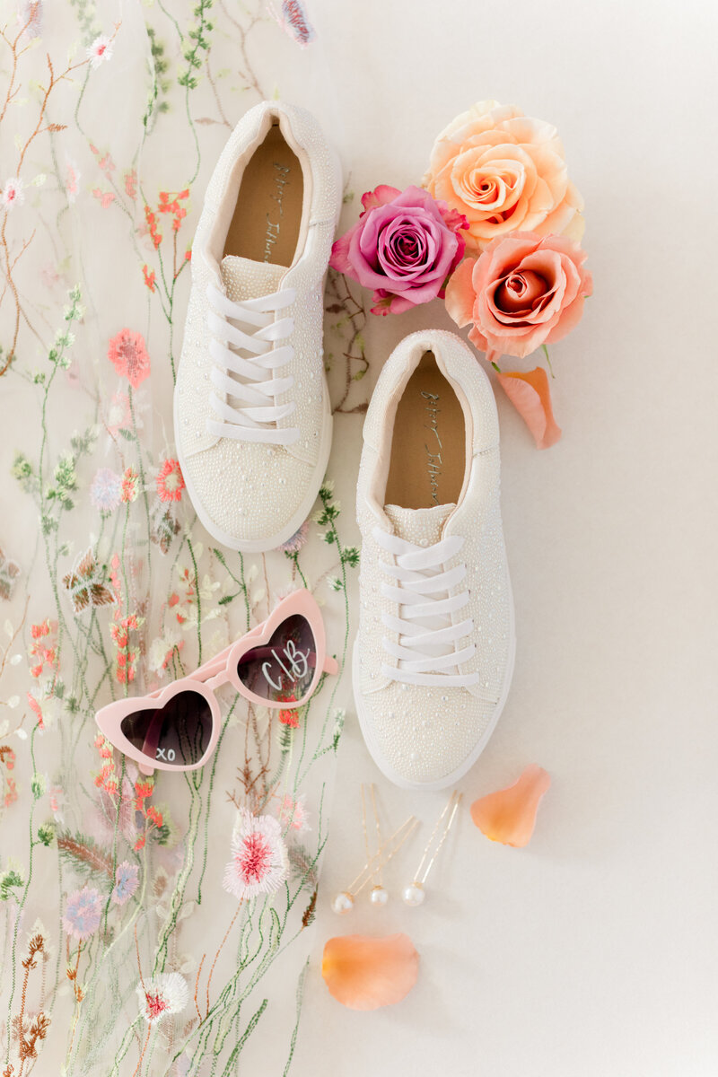 shoes, heart sunglasses, and pink and orange flowers