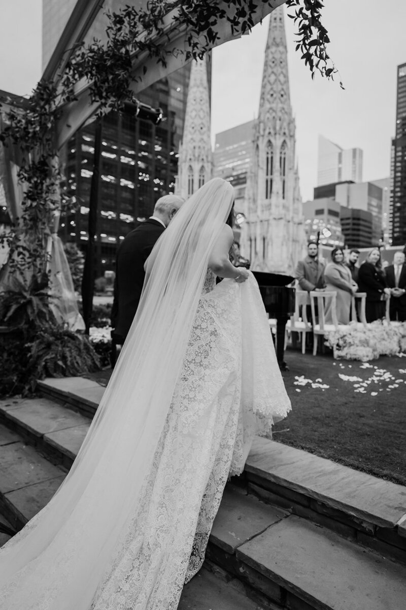 Newlyweds outside their wedding venue.