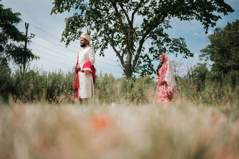 South Asian couple posing outside in New Jersey