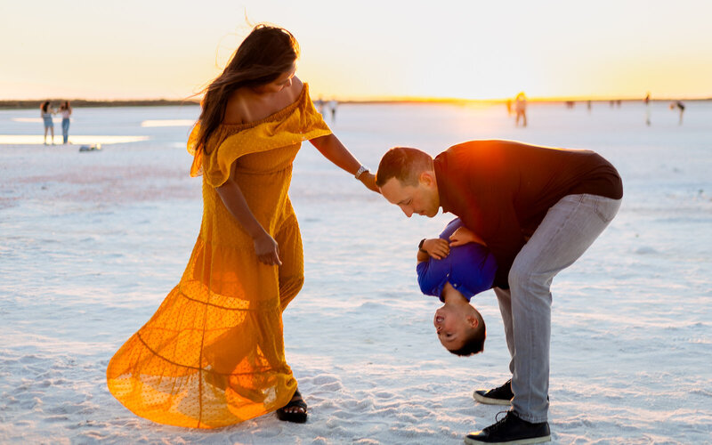 Sunset family salt flats session with playful moments by Ellobelle Photography family photographer