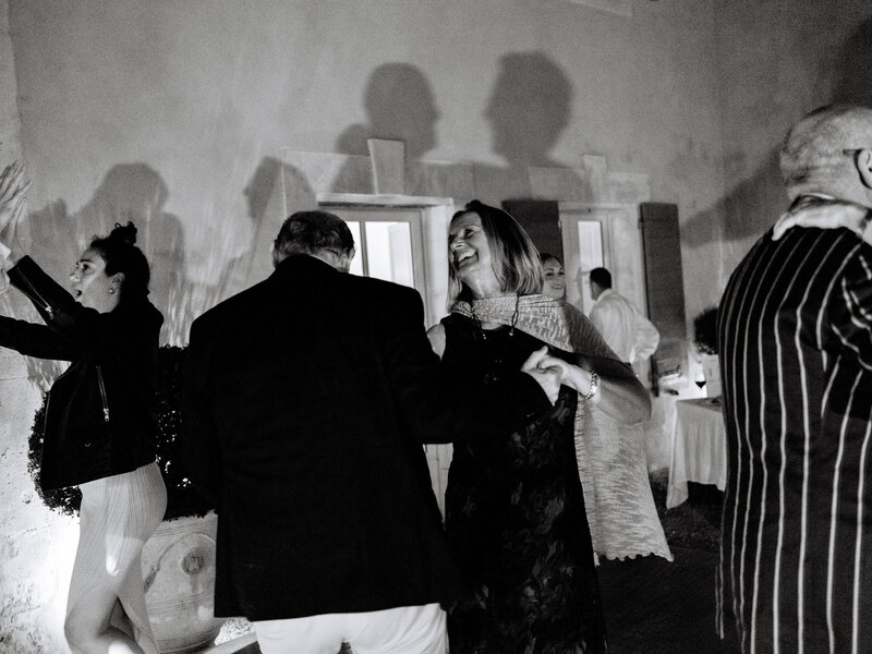 Bride and Groom Crossing Arms and Drinking Champagne