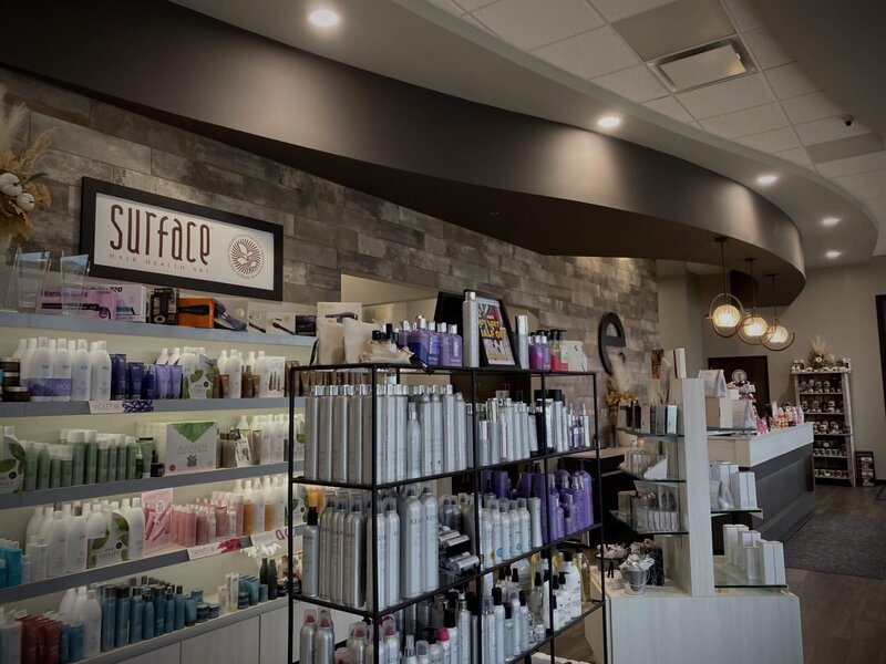 beauty products on display for retail purchases at elevate salon and spa in cedar rapids iowa blairs ferry rd location