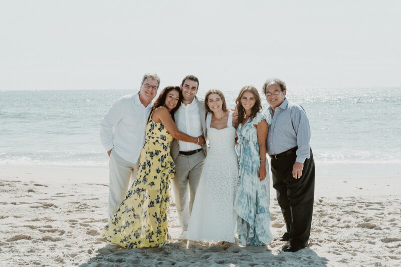 Family photo on beach at Laguna Beach wedding