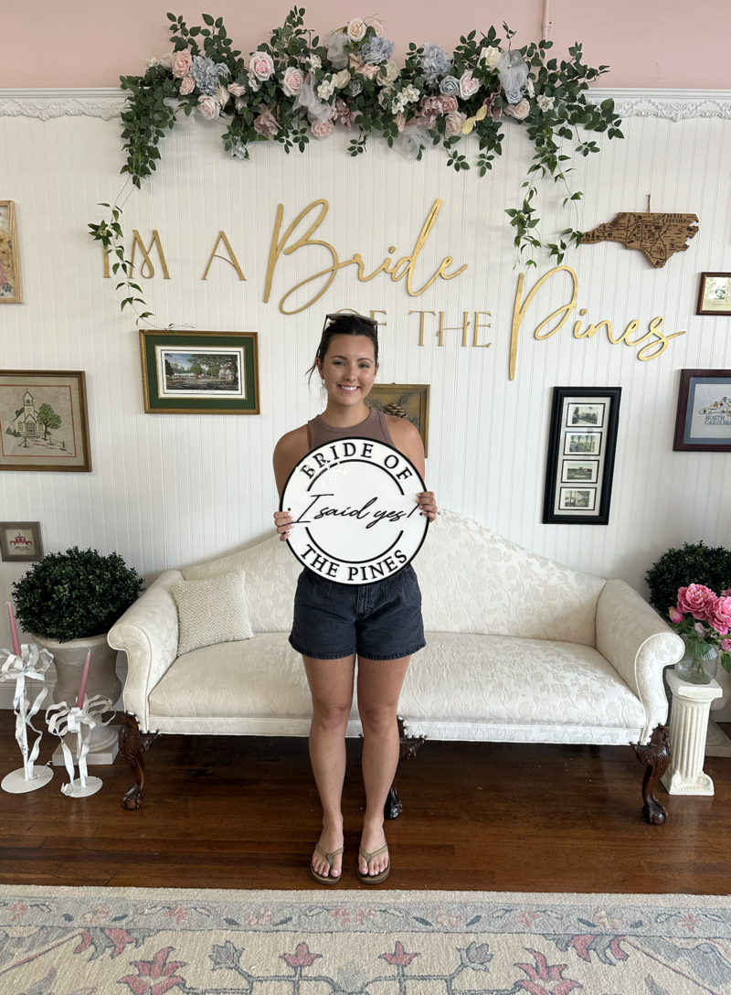 bride celebrating after saying yes to the dress in souther pines NC