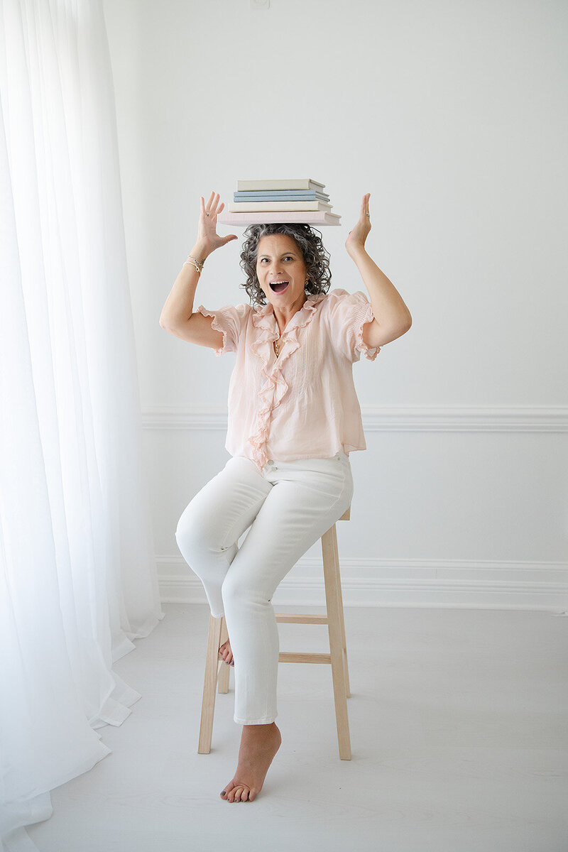 woman holding a pretty photo frame in hand