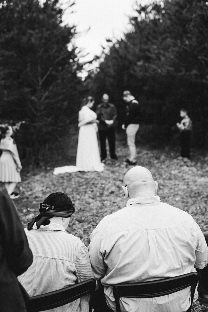 black and white photo of couple at wedding