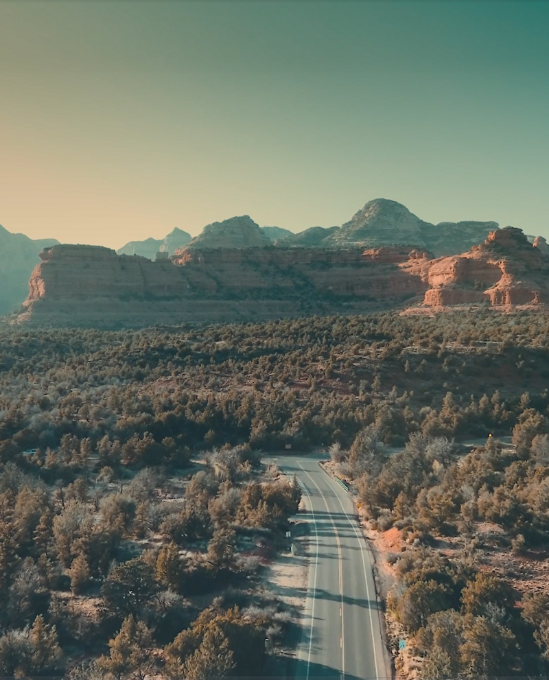 A winding road through the mountains of Sedona, AZ