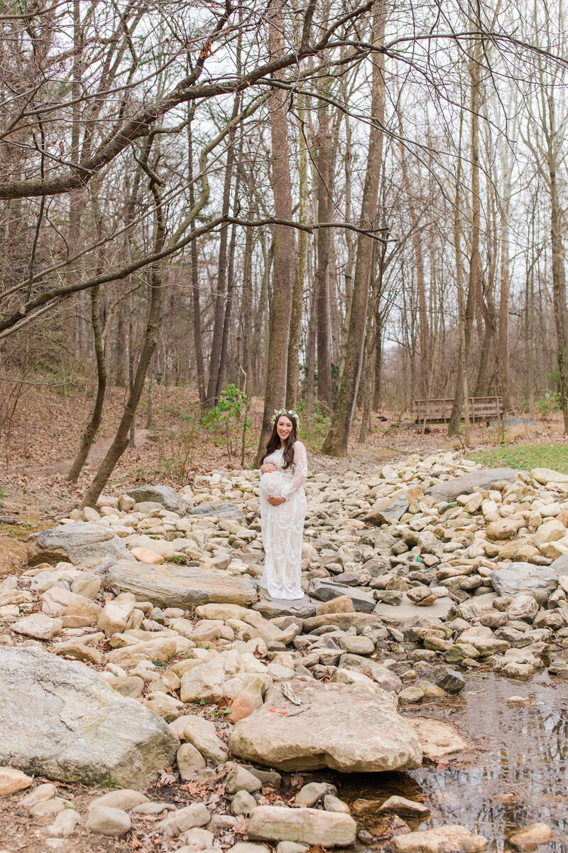 Pregnant mother glowing during a maternity photoshoot in Staunton, VA, capturing natural beauty and love