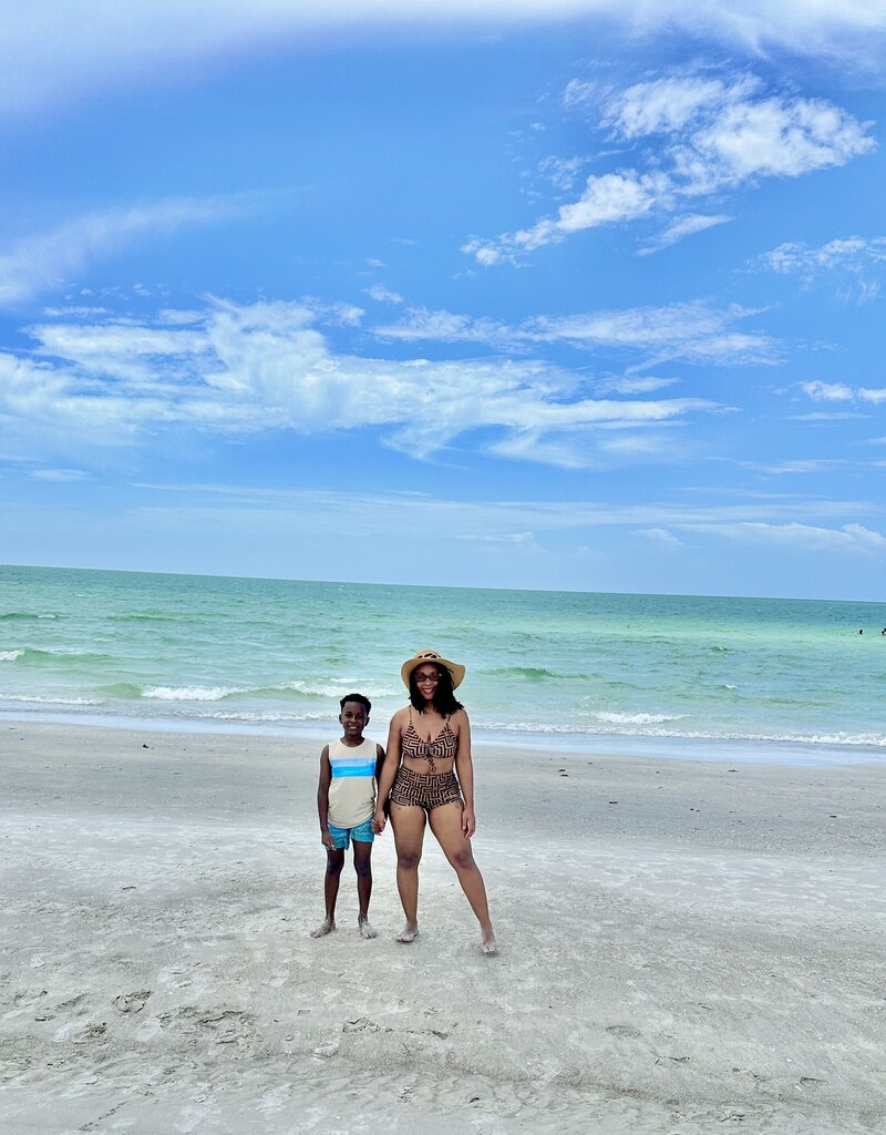 Latesha Lynch at beach with son