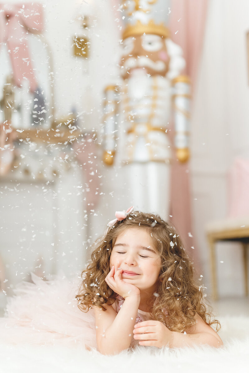 Simply Sweet Nutcracker Suite little girl in pink dress in front of Christmas tree