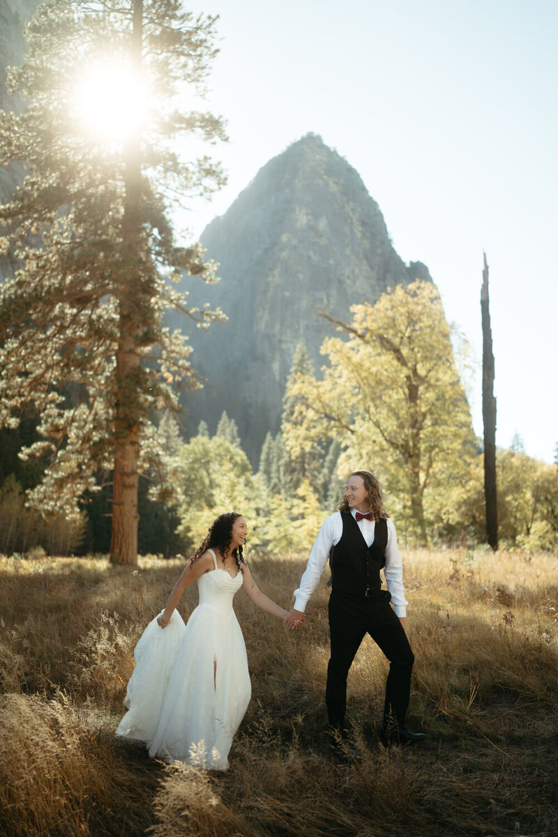 Bride and Groom jump into the Merced River while eloping in Yosemite