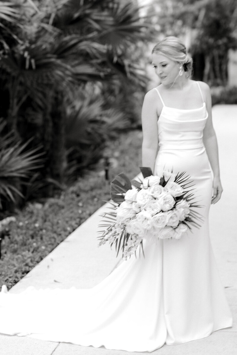 bride posing with bouquet