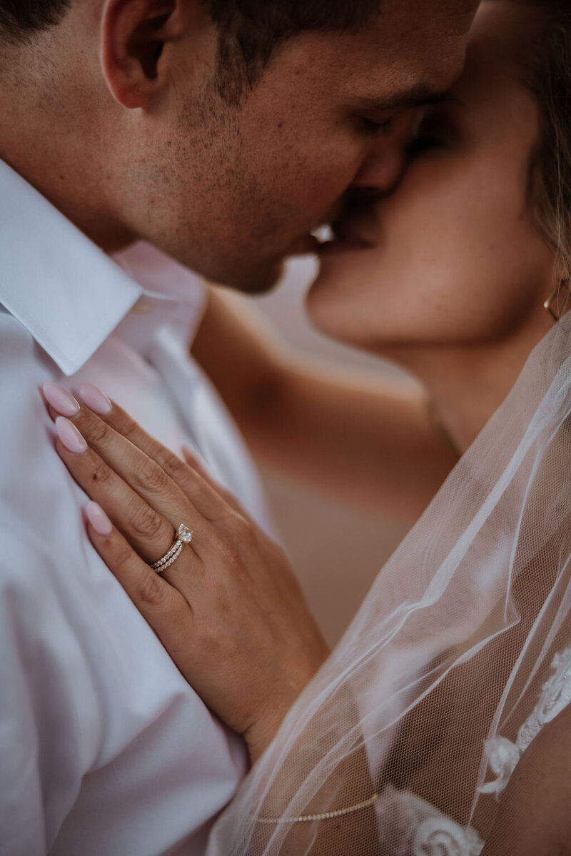 bride and groom kissing