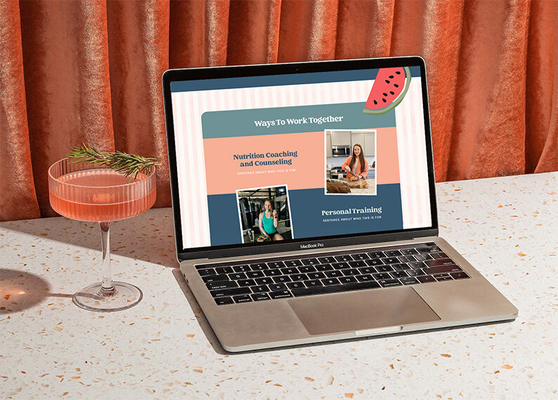 A laptop sits open on a set of stairs showcasing a website design for a pyschotherapist