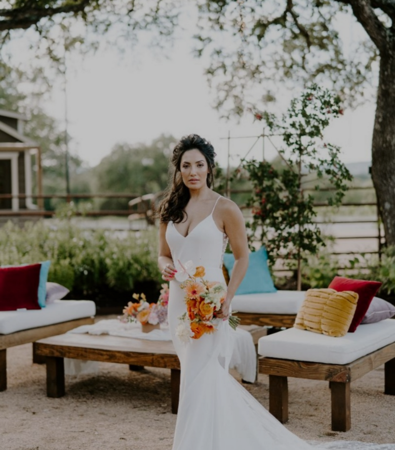 Latin X inspired  wedding outside with vibrant colors  set in a vineyard