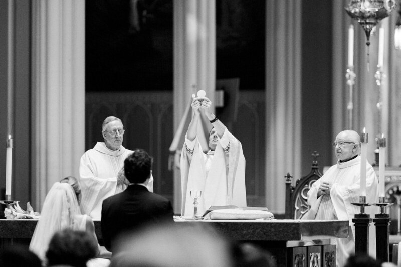 Church clergy leading a Catholic wedding ceremony
