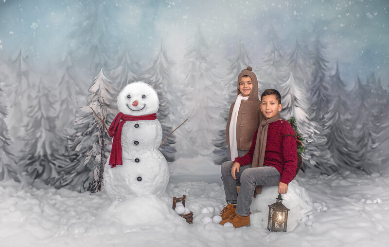  "Children photographed in a creative studio setting with fun props and vibrant backdrops, capturing their playful spirit in Ottawa."
