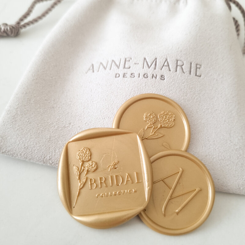 Branded wax seals and blush suede jewellery pouch for Anne-Marie Designs