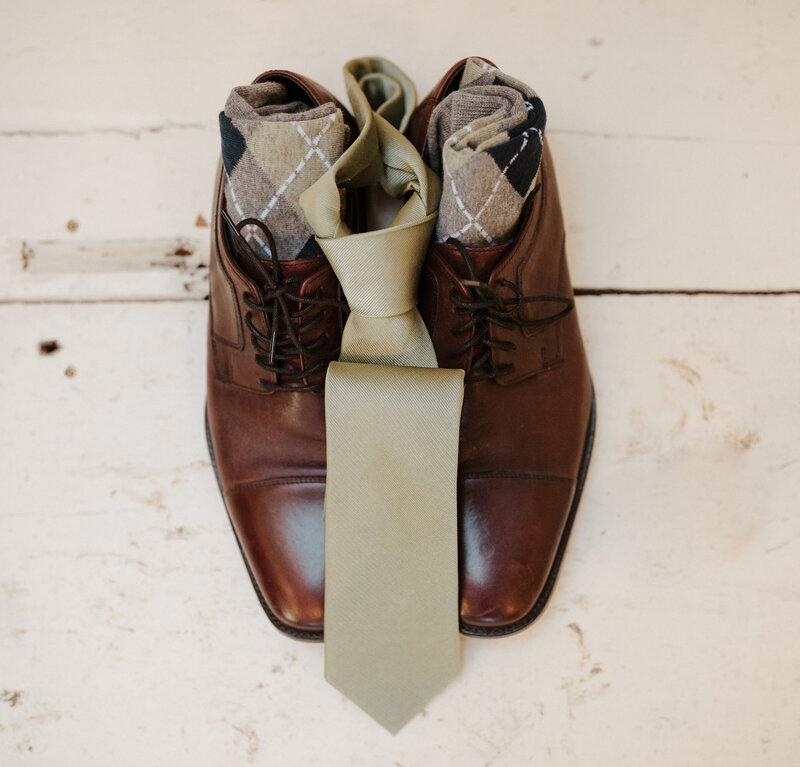 Grooms shoes and tie at wedding in Joshua Tree