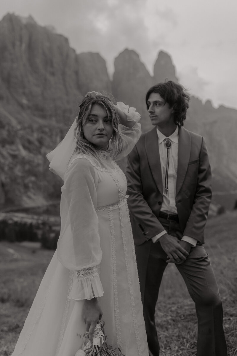 couple on dolomite mountains in italy elopement