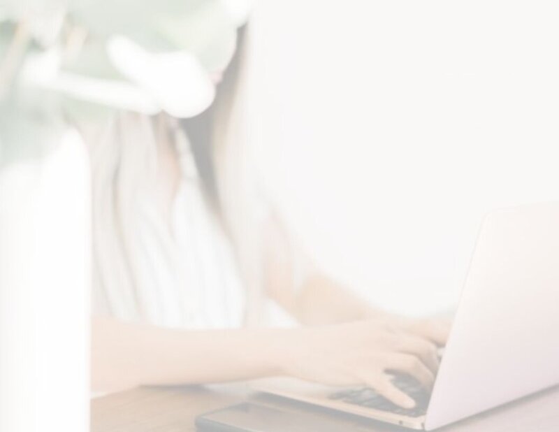 TS Financial Services typing on computer
