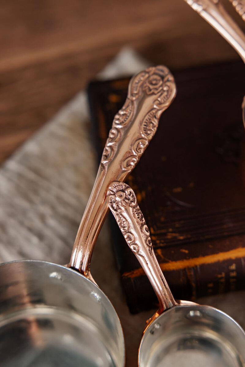 Coppermill kitchen measuring cup handles with carving detail