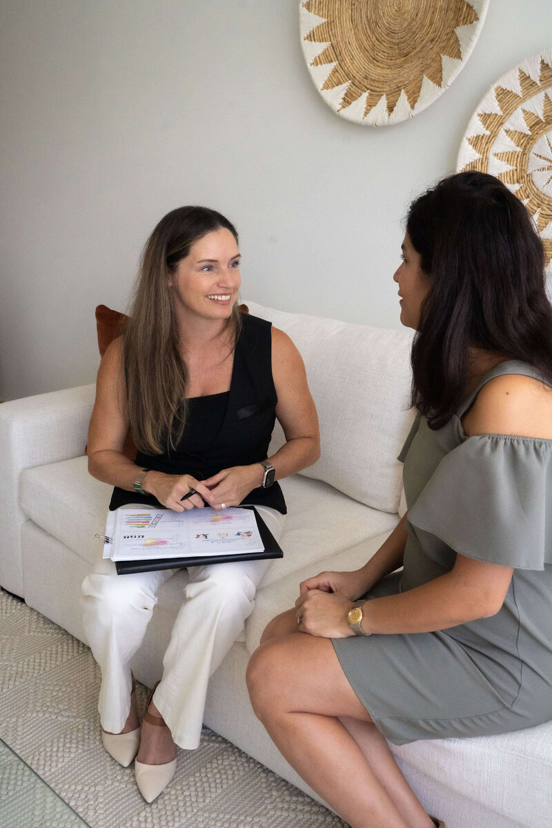 Castilia sitting with her client for her Empowered Parent Coaching Program.