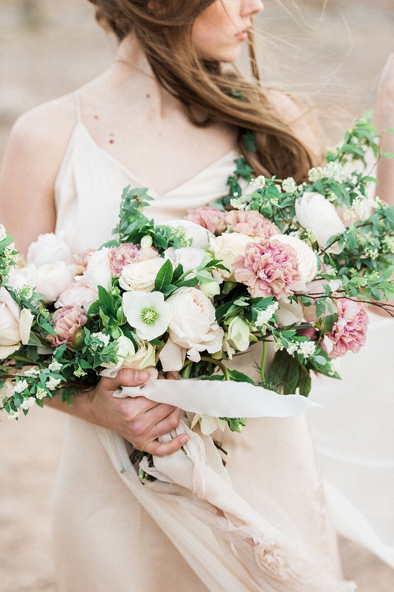 Bride and groom walk up memorial steps at their DC wedding