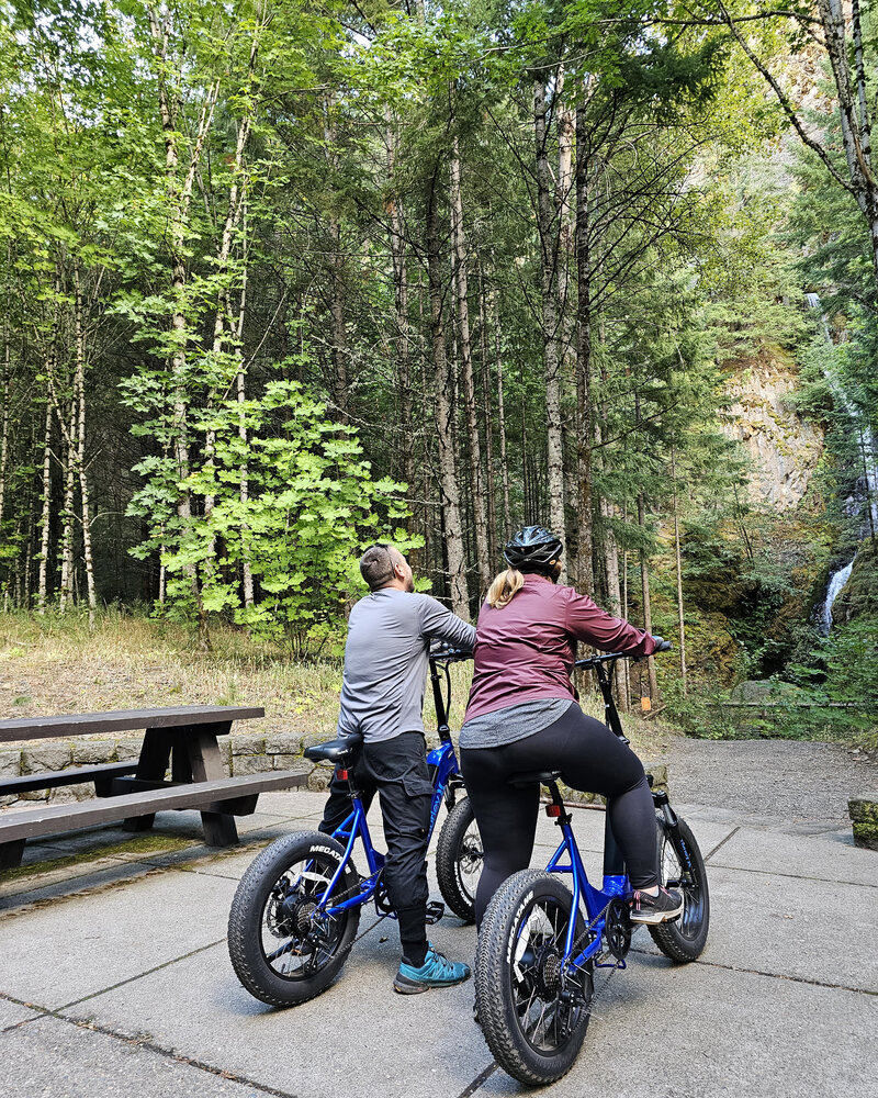 Take in breathtaking views as riders admire the landscape from their electric bikes at Viento State Park with The Gorge E-Bike Adventure Rentals