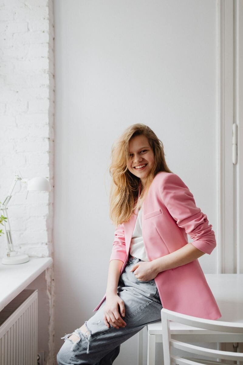 processed_kaboompics_beautiful-teenage-girl-with-long-blonde-hair-wearing-a-pink-jacket-21251