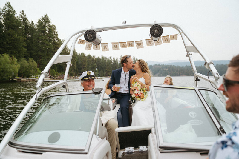 Bride and groom during wedding golden hour portrait session at Payette Lake, McCall, Idaho wedding - photographed by The Storytellers