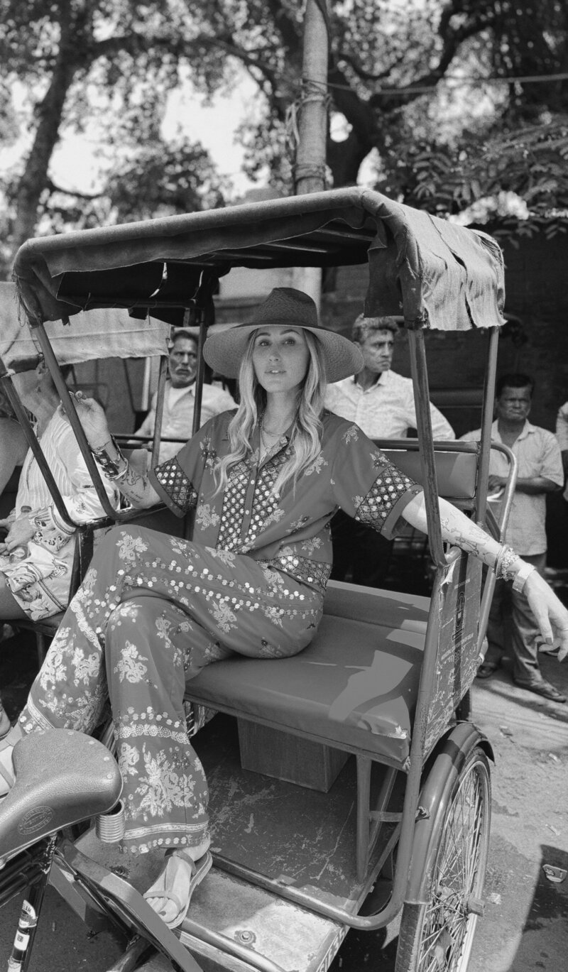 Alexis Stein sitting in the back of a rickshaw