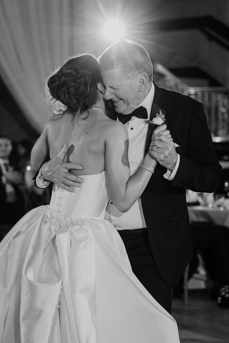 Bride getting into her wedding dress.