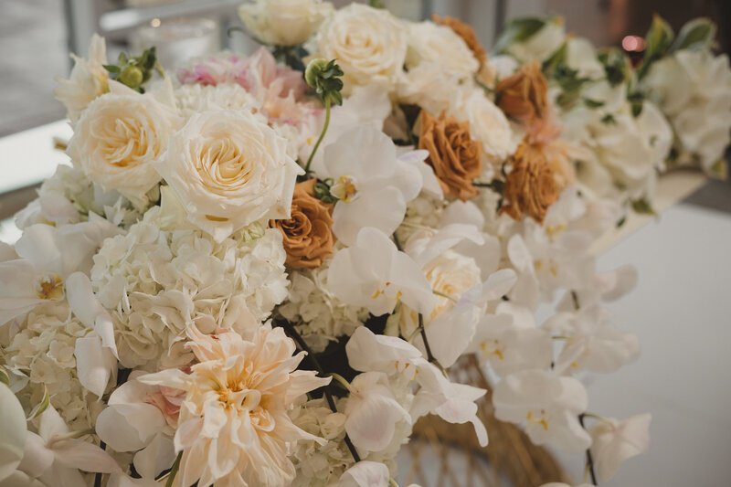 Swank Soiree Dallas Wedding Planner Jamie and Dwayne at The Bowden Wedding Venue - Reception floral arrangements