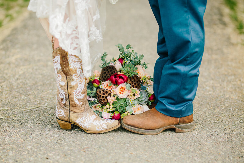 Jackson Hole photographers capture grand teton wedding with bride and groom's shoes touching
