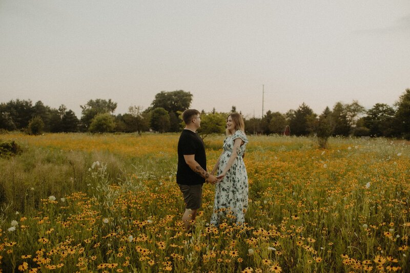 flower field couples maternity photos