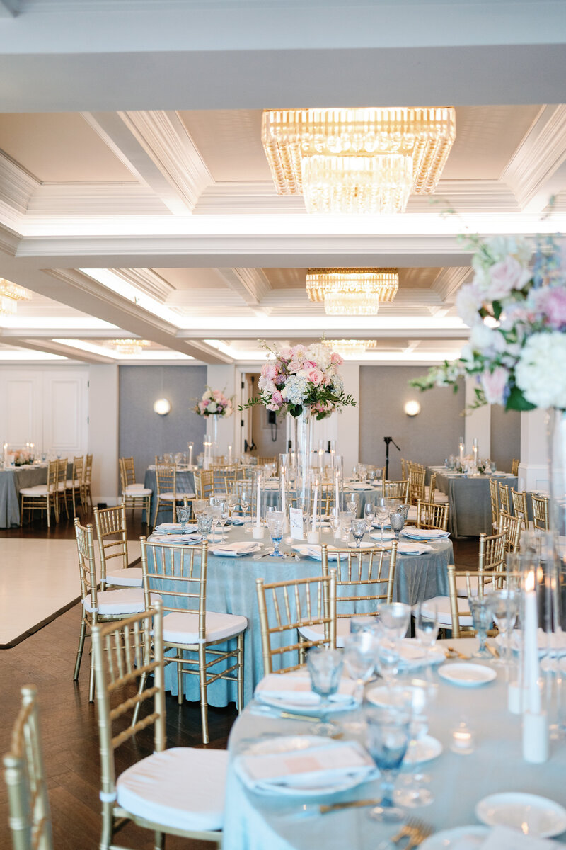 Romantic tablescape design with lush florals and greenery