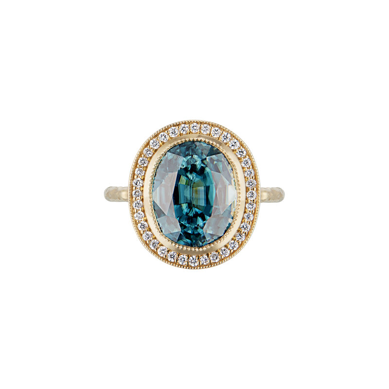 Zircon and diamond halo ring