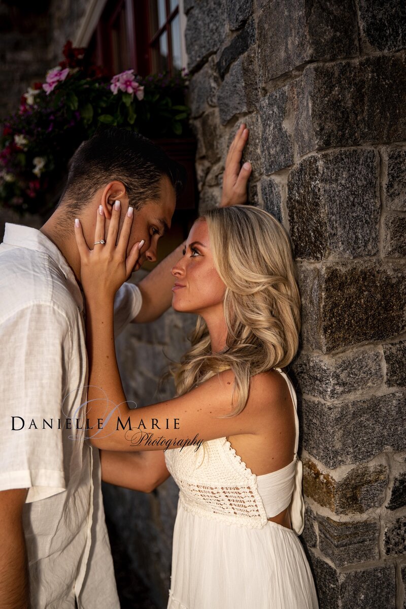 Beautiful couple posing for their engagement shoots in Lake Hopatcong New Jersey