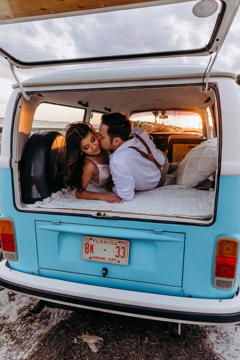 portraits of a couple popping champagne during their florida elopement