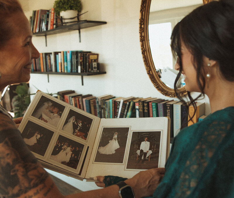 Kaylea flipping through photo albums