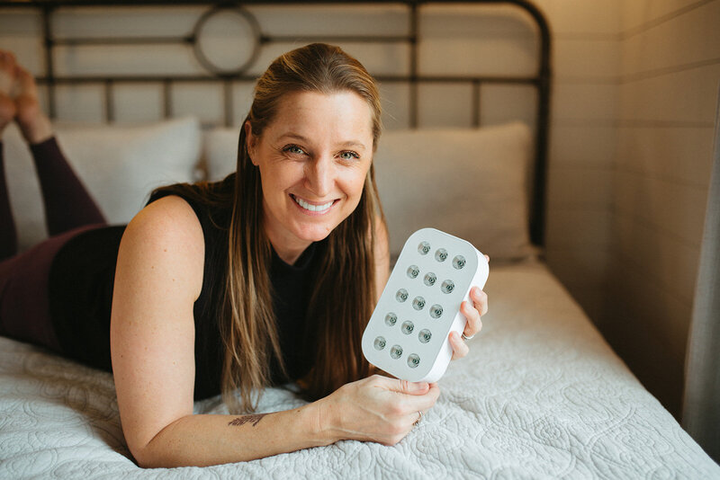 Hand holding Primally Pure Vanilla + Citrus deodorant