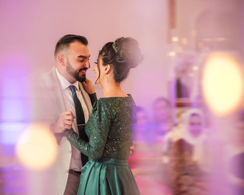 Sahar & Mustafa gaze into each other's eyes as they dance before their walima at the waterford event center
