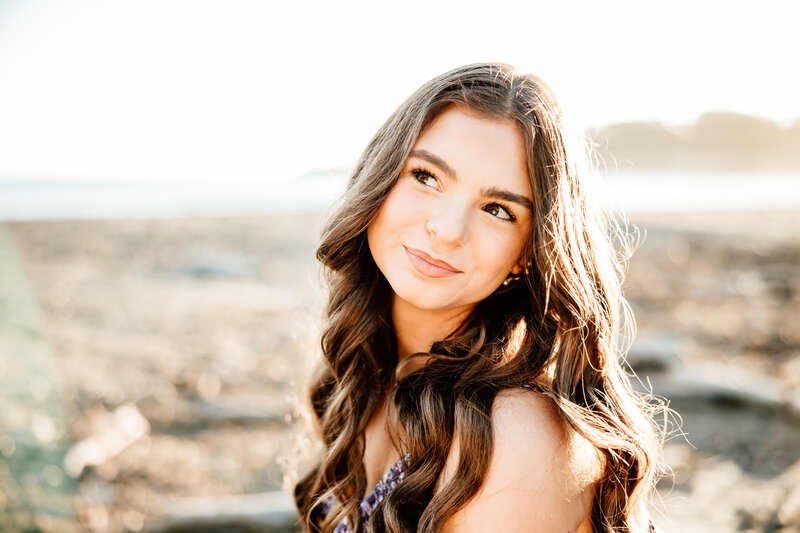 Upclose portrait of a smiling little girl for her family photography session in San Luis Obispo. 